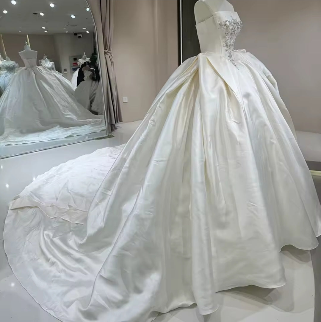 Elegantly Timeless and Simple Strapless Multi Faceted Beading With Sculpted Waist Detail 2025 Bridal And Ceremonial Ball Gown