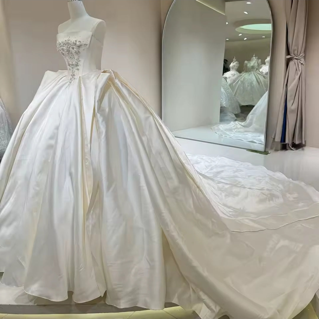 Elegantly Timeless and Simple Strapless Multi Faceted Beading With Sculpted Waist Detail 2025 Bridal And Ceremonial Ball Gown