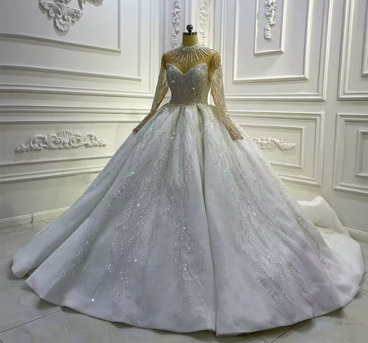 Long Sleeve Illusion Multi Beaded Hanging Sweetheart Mid Neck Shimmering Princess Bridal Gown