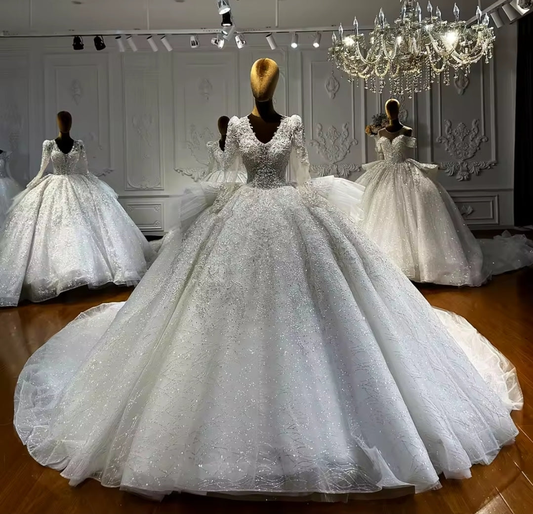 Multi Beaded Long Sleeve Bridal Ball Gown With Layered Puff Back Detail With Open Back And Lace Up