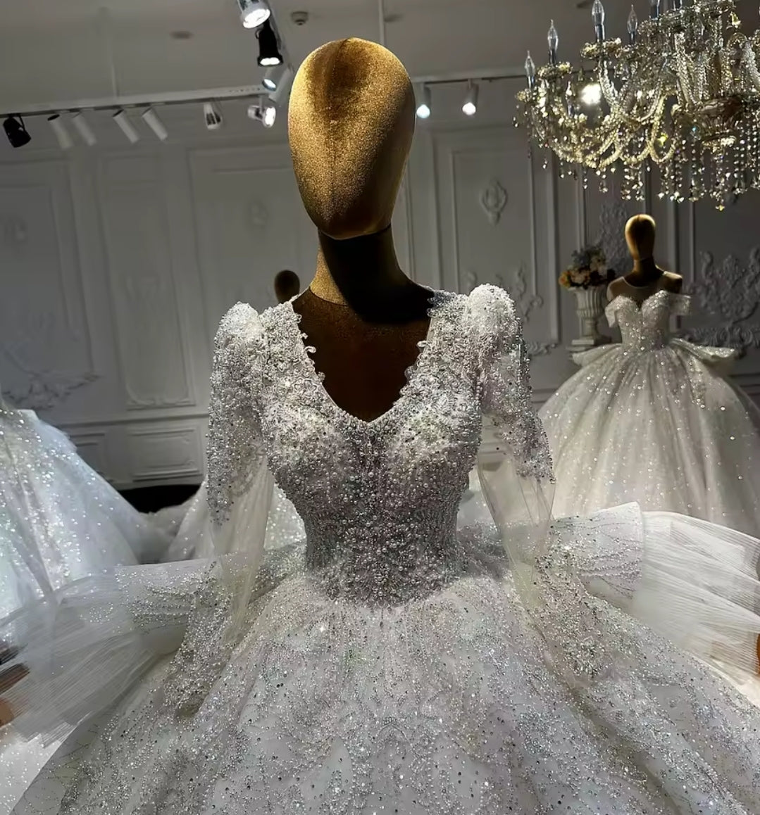 Multi Beaded Long Sleeve Bridal Ball Gown With Layered Puff Back Detail With Open Back And Lace Up