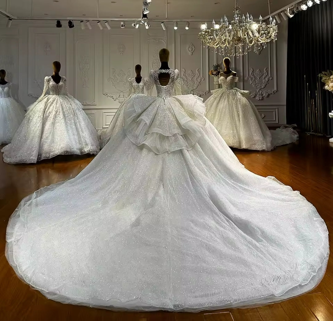 Multi Beaded Long Sleeve Bridal Ball Gown With Layered Puff Back Detail With Open Back And Lace Up