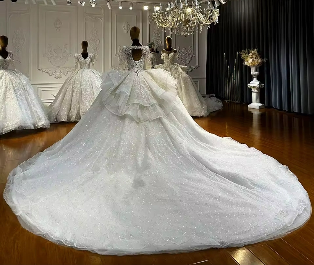 Multi Beaded Long Sleeve Bridal Ball Gown With Layered Puff Back Detail With Open Back And Lace Up