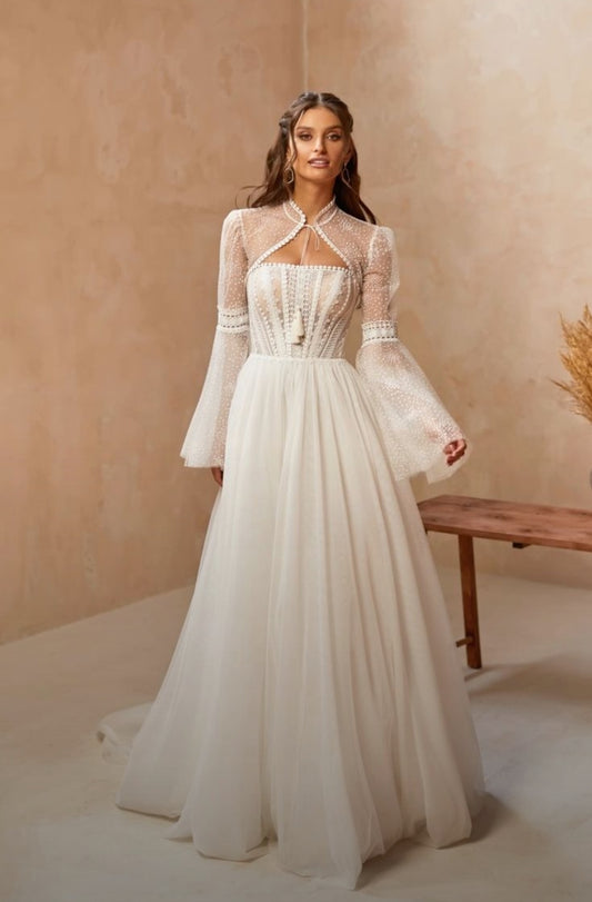 Boho Lace Dotted Strapless Boat Neck With Draped Tassel Detail A-Line Gown With Lace Up Closure And Matching Detached Flare Sleeve Bolero