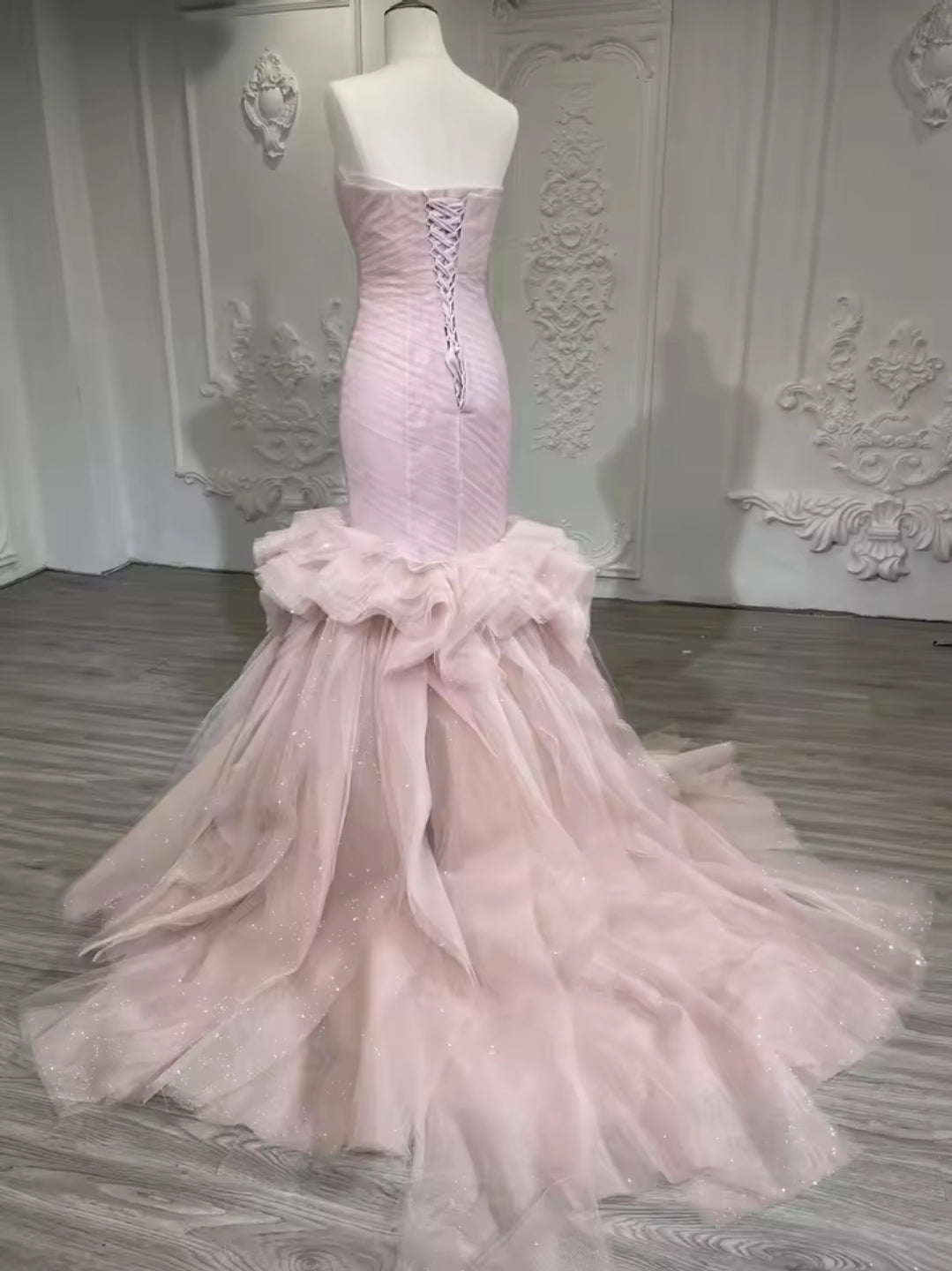 Strapless Boat Neck Scattered Beaded Detail With Pleated Criss Cross Design And Layered Skirt Fit To Flare Gown