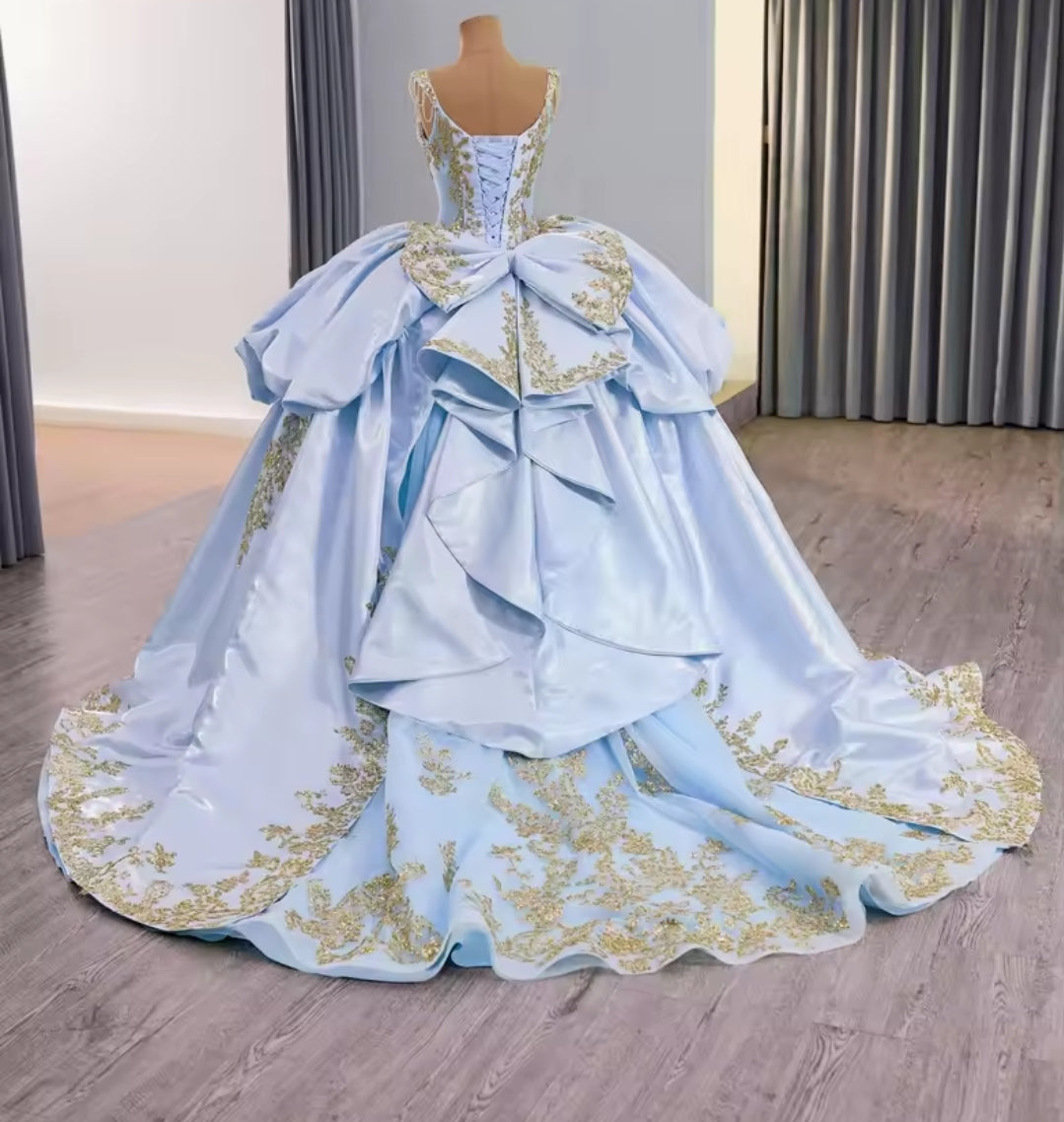 Multi Crystal Beaded Cap Sleeve Blue V Neck Corset A-Line Gone With 3D Floral Motiffs, Scattered Gold Appliqués And Oversized Back Bow Detail