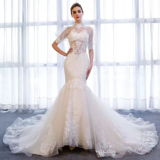 Ivory Sheer Half Sleeve Mid Neck Sheer Bodice With Lace Appliqué Detai Open Back Lace Up Fit To Flare Bridal Gown With 100 CM Train