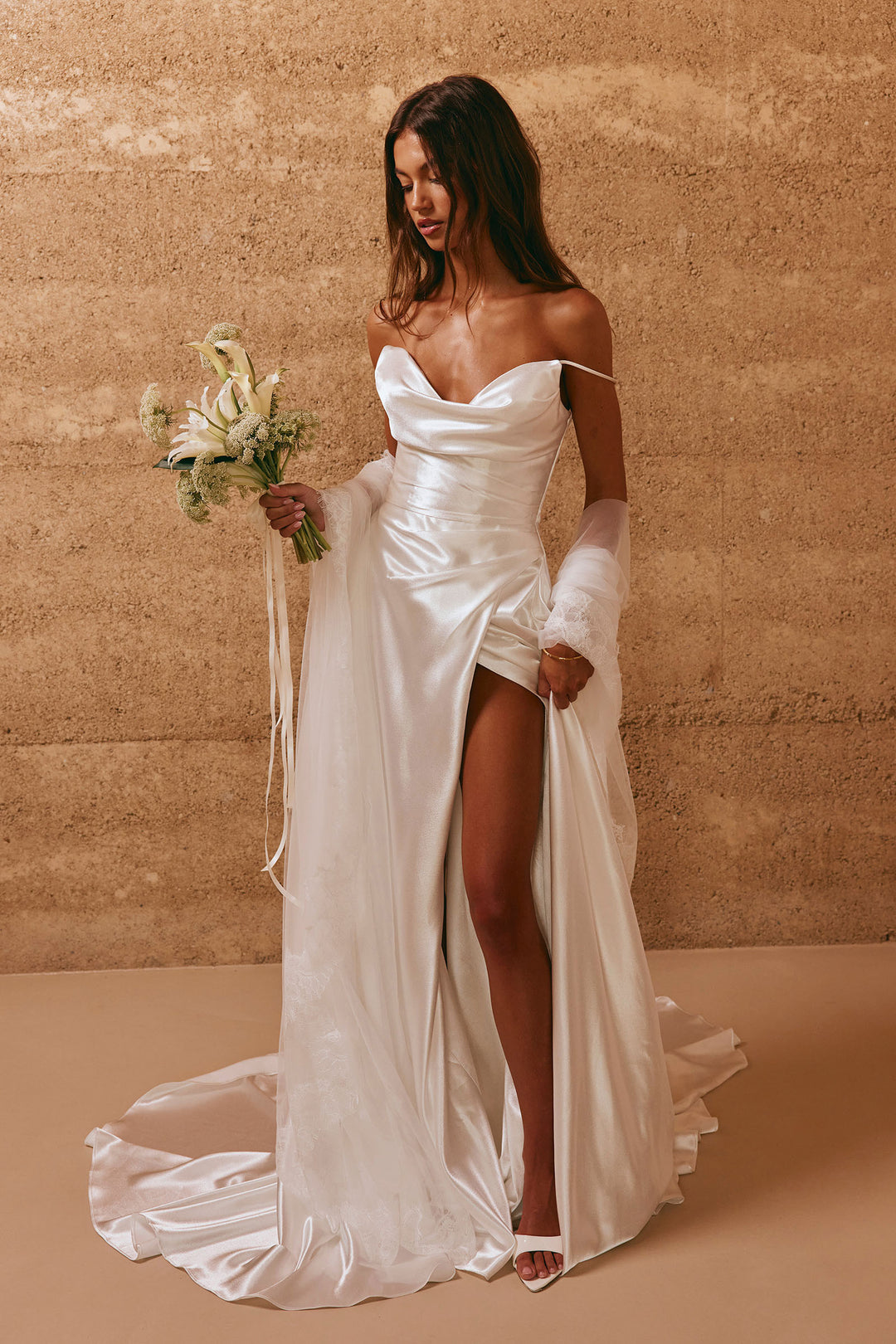 Simply Flawless And Flattering Satin Off The Shoulder Asymmetric Pleated Waist Gown With Split Hem