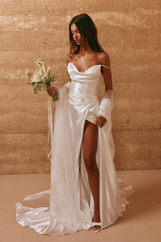 Simply Flawless And Flattering Satin Off The Shoulder Asymmetric Pleated Waist Gown With Split Hem