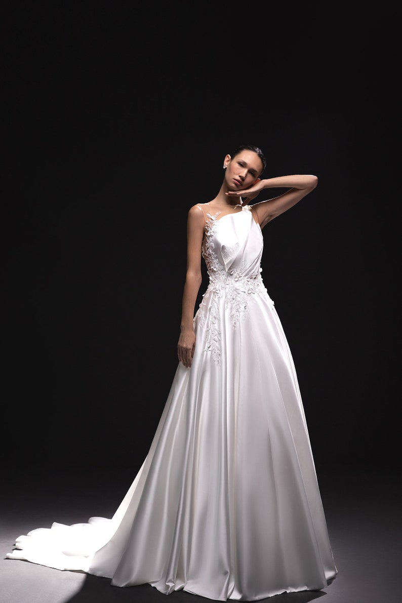 Sleeveless Asymmetrical Illusion Floral Beaded Appliqué A-Line Bridal Gown