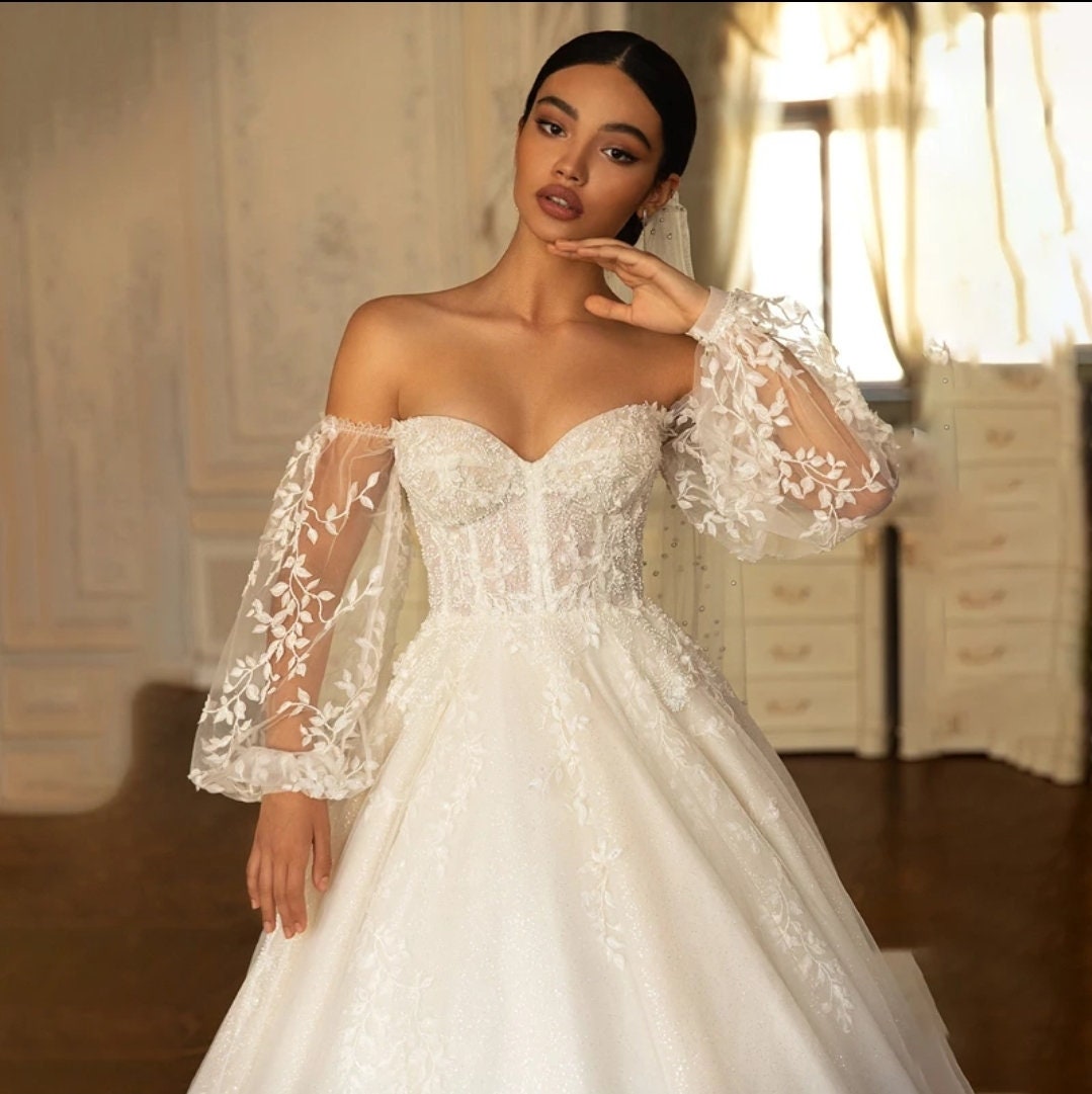 Bustier Inspired Sheer Off The Shoulder Vine Appliques Wedding Gown With Chapel Train