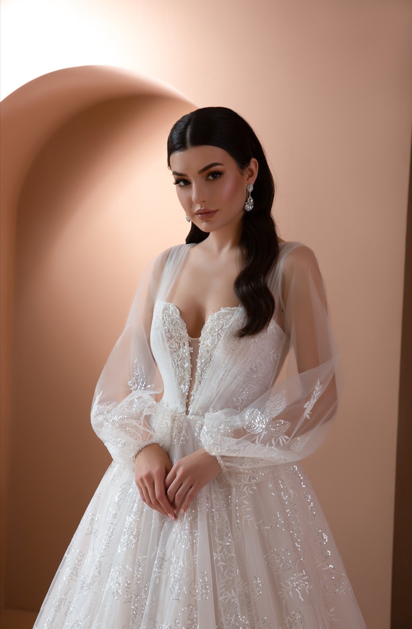 Sheer Long Sleeve Floral Sequined Attached Overlay Jacket And Shimmering Bridal Gown