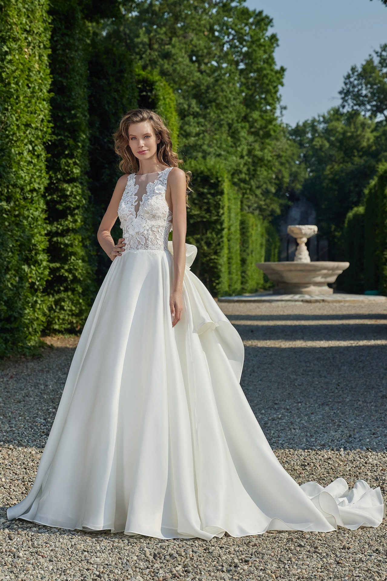 High Waisted  Sleeveless Illusion Gown With Layered & Ruffled Bow Knot Back