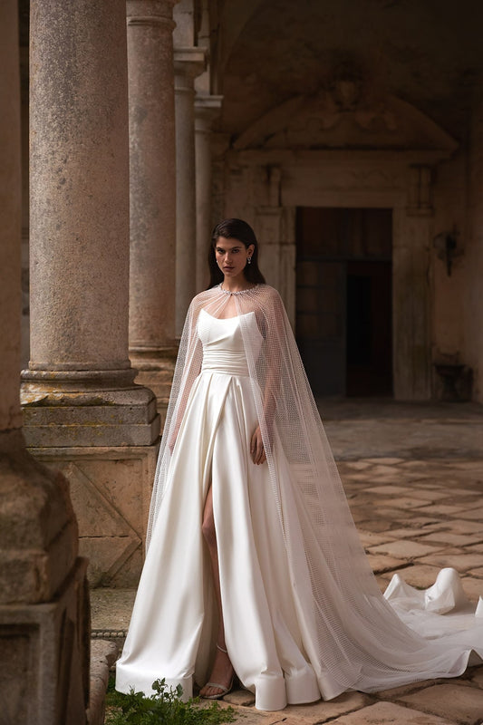 Satin Strapless Pointed Pleated Corset A-Line Gown With High Split Hem And  Dotted Tulle Cape