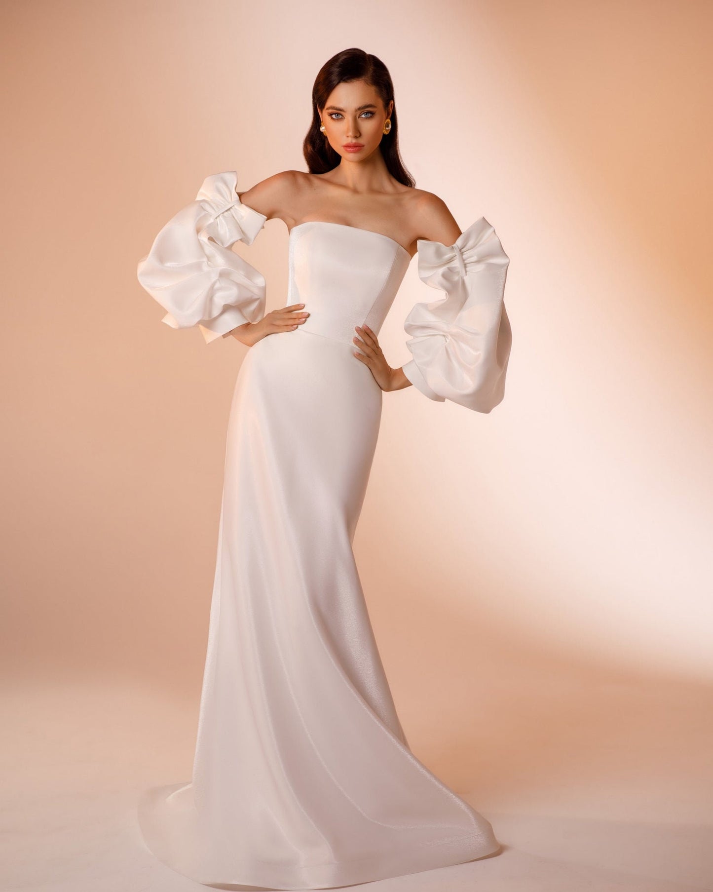 Elegant And Tasteful Multi Style Strapless Gown With Included Detached Sleeves And Detachable Knot Train