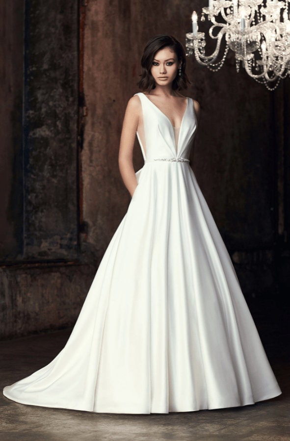 Sleeveless Deep V Illusion A-Line Gown With Beaded Embroidery "LOVE" Scripted Back Bow Knot