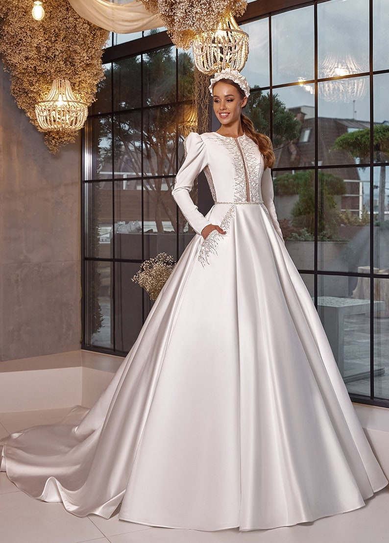 Beautifully Beaded Long Sleeve Modest A-Line Sheek Ceremonial Bridal Gown