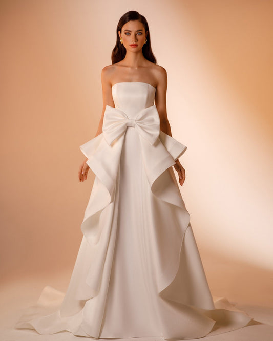 Elegant And Tasteful Multi Style Strapless Gown With Included Detached Sleeves And Detachable Knot Train