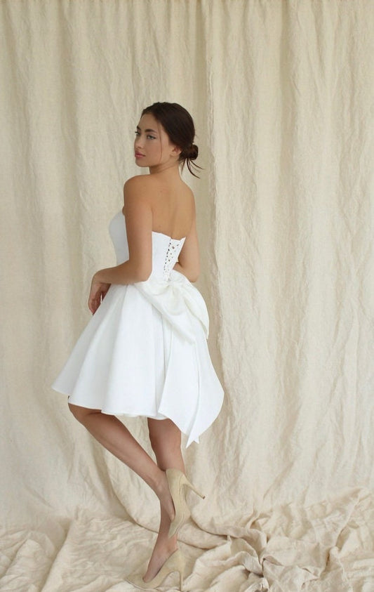 Short & Sweet Above The Knee Strapless Dress With Tie Up Back And Bow Knot Accent