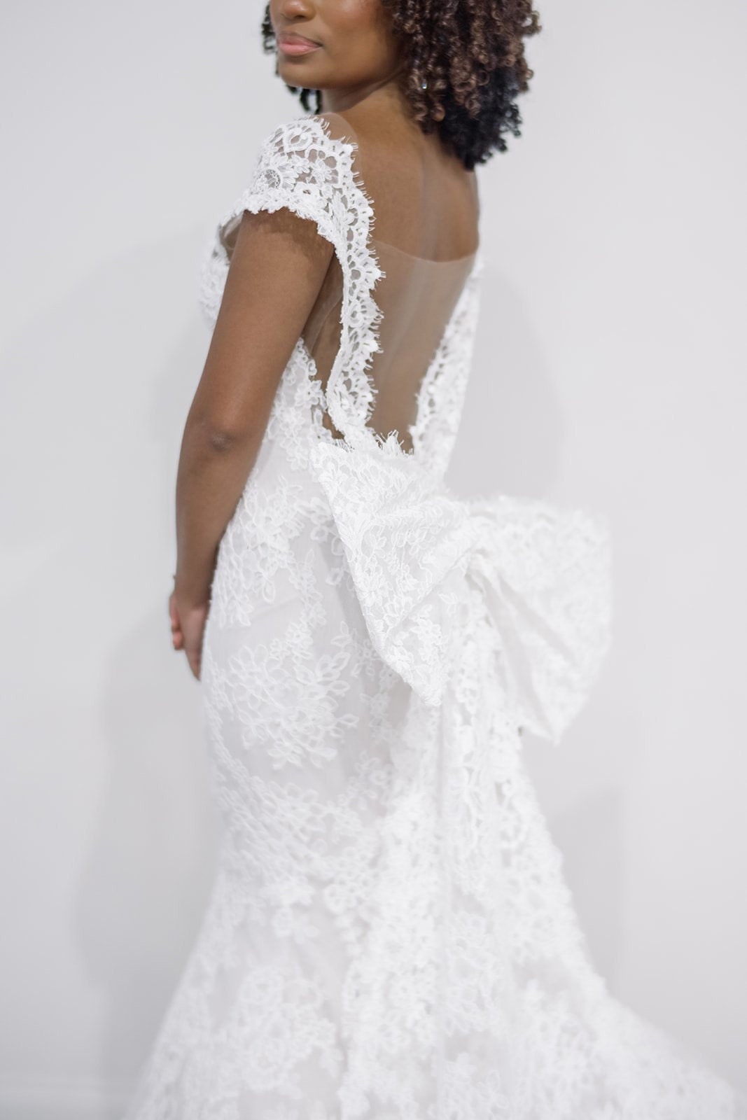 Cap Sleeve Full Floral Delicate Lace Fit To Flare Gown With Oversized Bow Knot Train