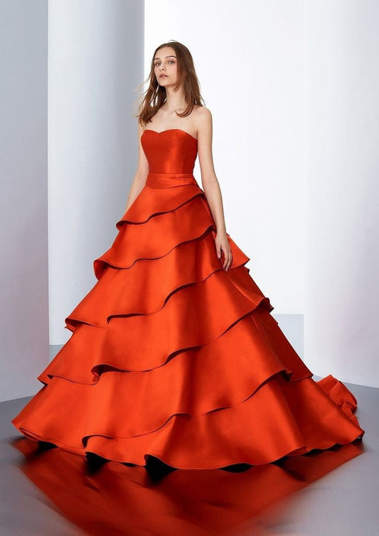 Strapless Smooth Satin Bodice With Rippled And Layered Hem Skirt And Tie Up Back Gown