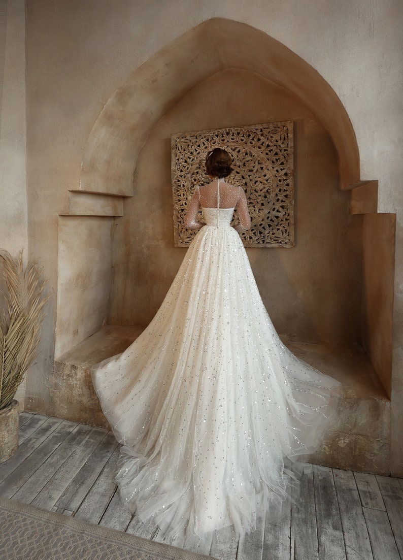 Whimsical Shimmering Sparkling Long Sleeve Mid Neck Sophisticated Sweetheart Bridal Gown