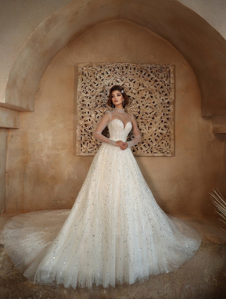 Whimsical Shimmering Sparkling Long Sleeve Mid Neck Sophisticated Sweetheart Bridal Gown