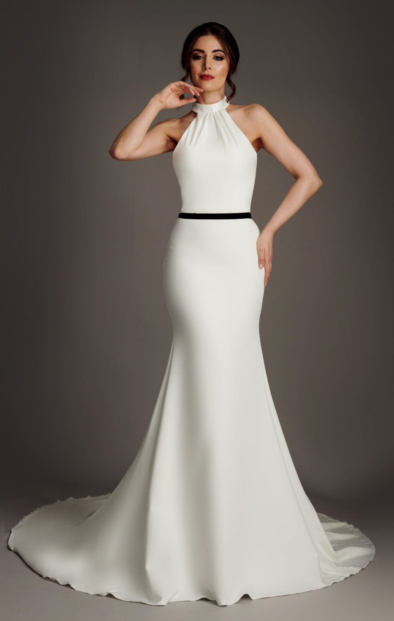 Sleeveless Minimalist Pleated Halter Trumpet Gown With Black Belted Sash