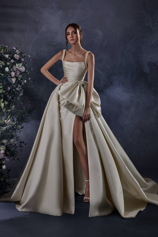 Pearl Beaded Spaghetti Strap Pleated Oversized Bow Knot Waistline Detail A-Line Gown With Thigh High Split Hem