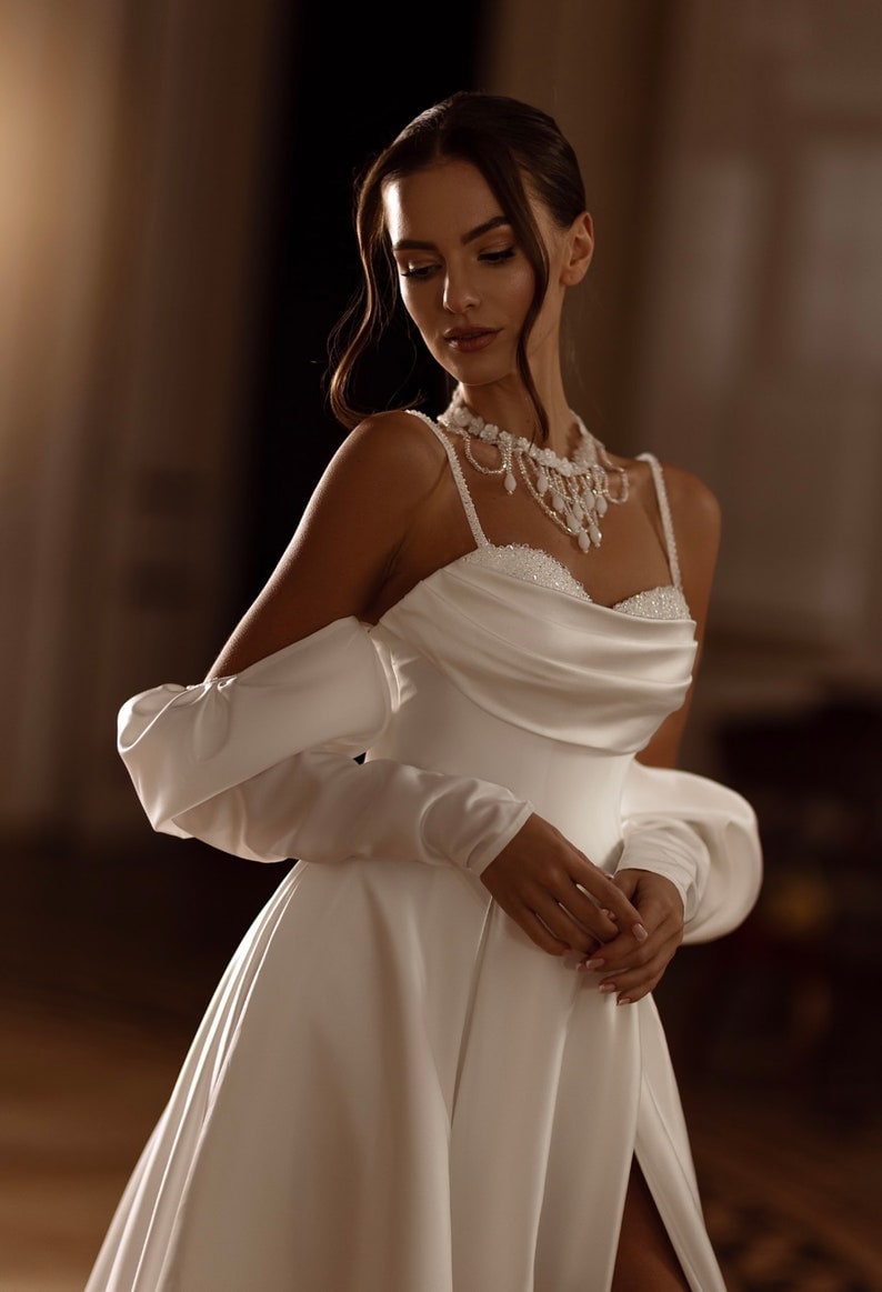 Crystal Beaded Spaghetti Strap Draped Sweetheart Half Sleeve Crystal Embellished Split Hem Trumpet Gown With Lace Up Enclosure