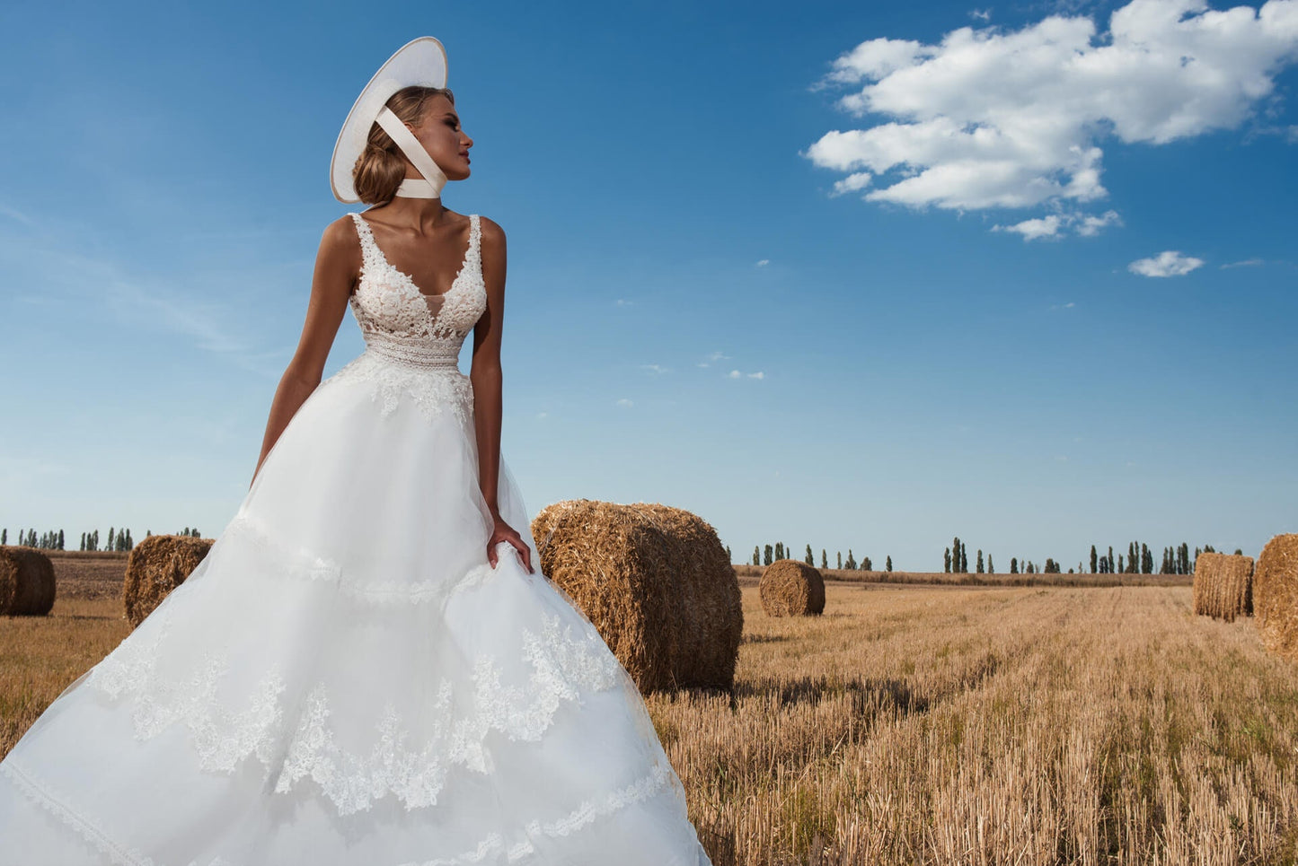 Beautiful Beaded Sequin Floral Plunging V Neck Sleeveless Boho Country Inspired A-Line Bridal Gown