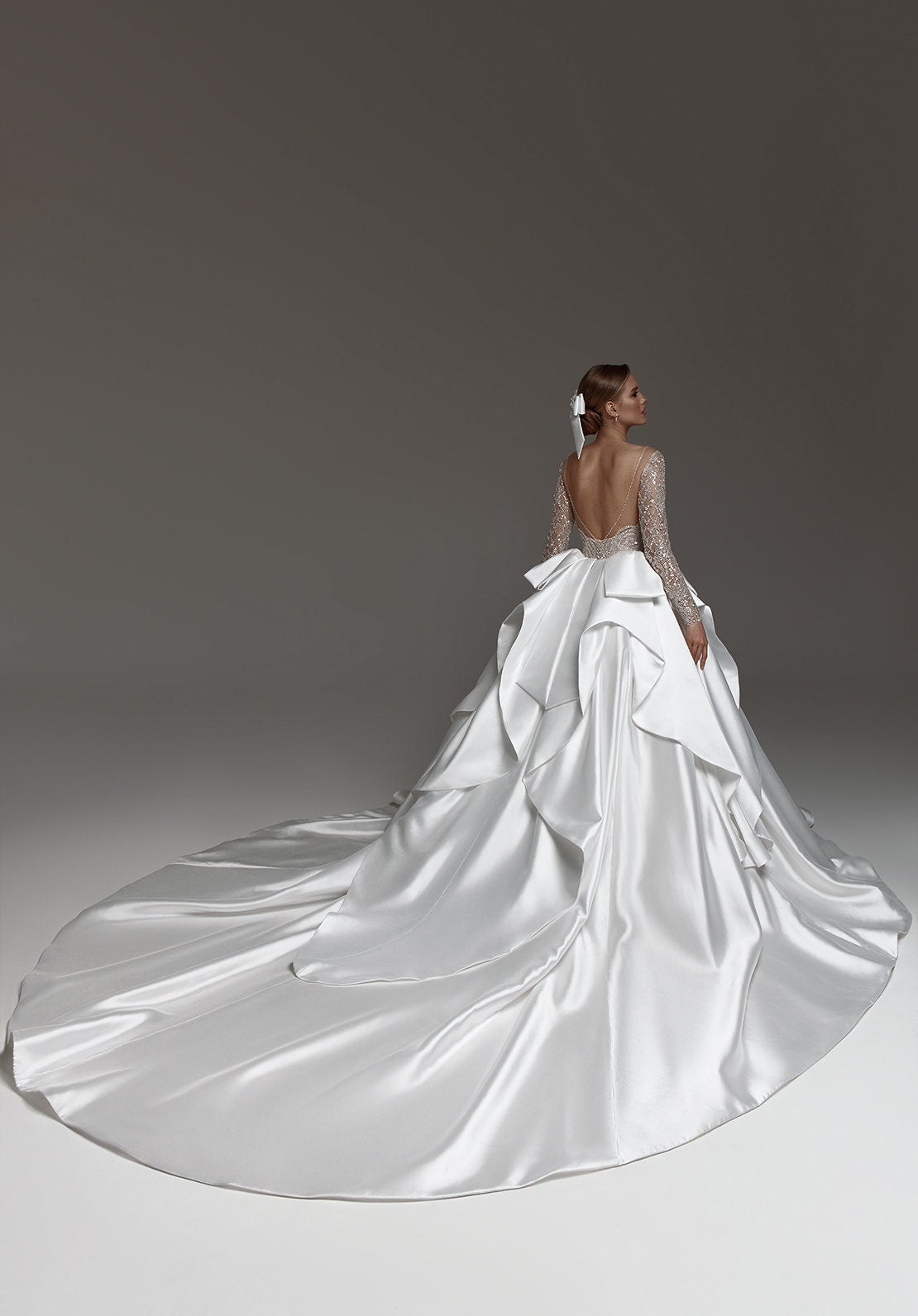 Crystal Beaded Plunging Illusion Sweetheart Long Sleeve A-Line Satin Pleated And Beautifully Layered Back Train With Open Back Gown