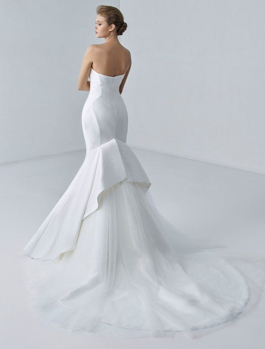 Fit & Flare Strapless Sweetheart Empire Waist Minimalist Gown With Pulled Up Back And Layered Train