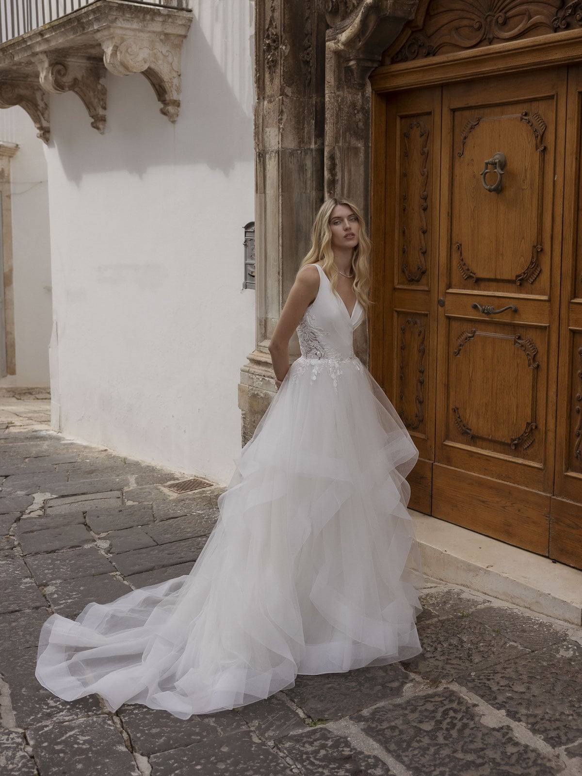 Pleated V Neck Spaghetti Strap Ruffled Layered Skirt With Floral Cut Out Lace Appliqués Sides Bridal Gown