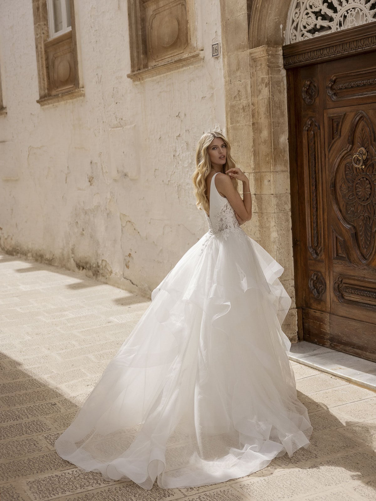 Pleated V Neck Spaghetti Strap Ruffled Layered Skirt With Floral Cut Out Lace Appliqués Sides Bridal Gown