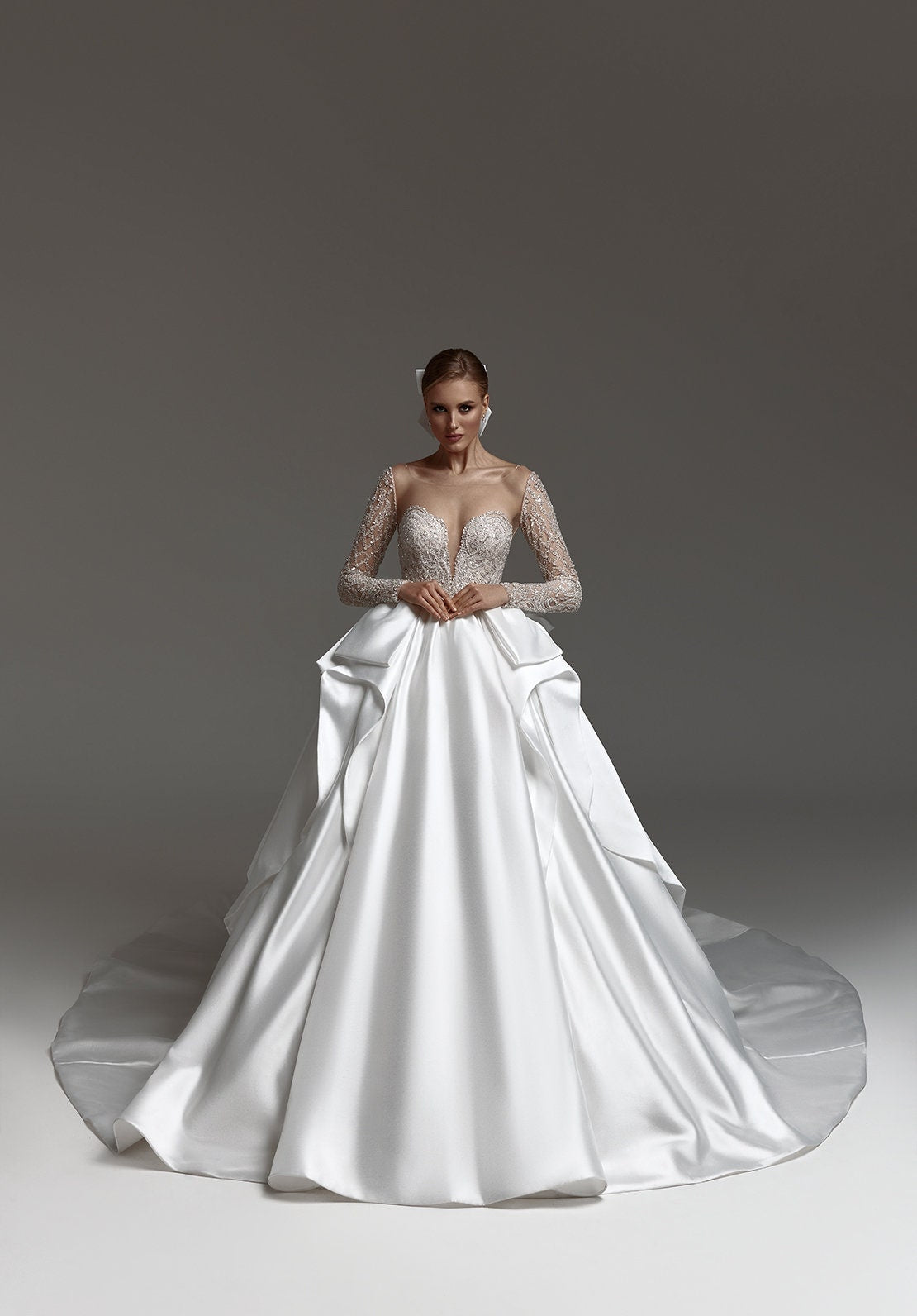 Crystal Beaded Plunging Illusion Sweetheart Long Sleeve A-Line Satin Pleated And Beautifully Layered Back Train With Open Back Gown