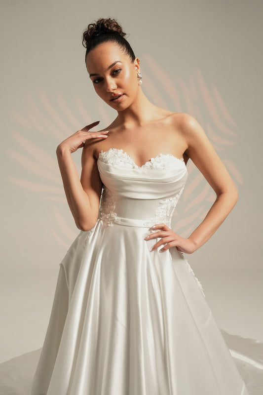 Strapless Sweetheart Underlay With Pleated Scoop Overlay With Floral Sides And Waistline Sash Crystal Beaded Appliqué Detail A-Line Gown