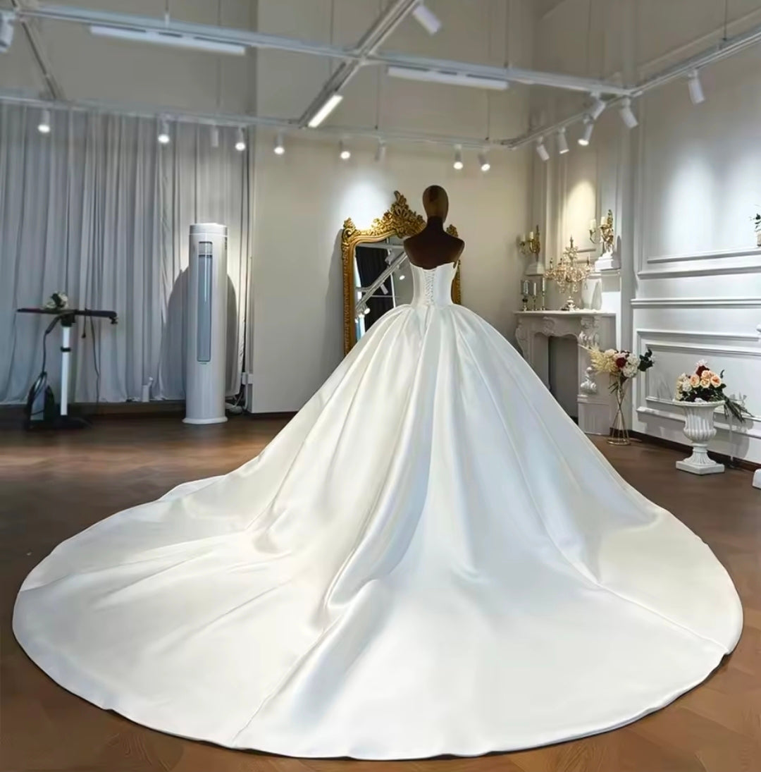 Modern And Modest Mikado Satin Strapless Beaded Neckline A-Line Gown With Long Sleeve Beaded Jacket.