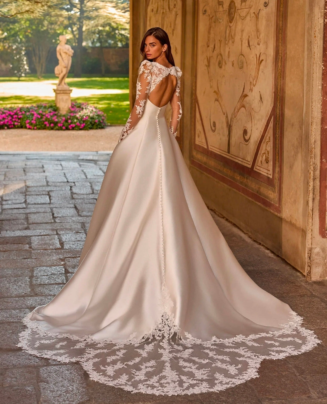 Classically Romantic Long Sleeve Lace Square Neckline With Mikado Waistline And Skirt And Lace Trimmed Train Detail A-Line Gown