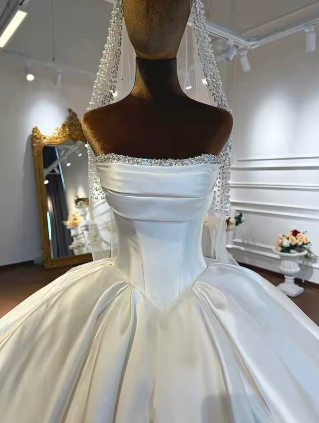 Modern And Modest Mikado Satin Strapless Beaded Neckline A-Line Gown With Long Sleeve Beaded Jacket.