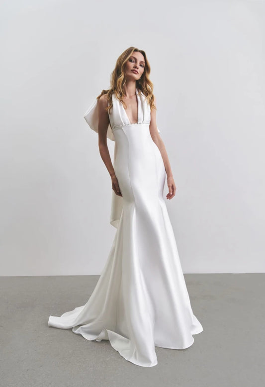 Sophisticated Mikado Fitted Bridal Gown With Pleated Sexy V-Neckline With Wide Straps, Decorated Small Pearl Beaded Bodice And Lush Back Big Bow Detail