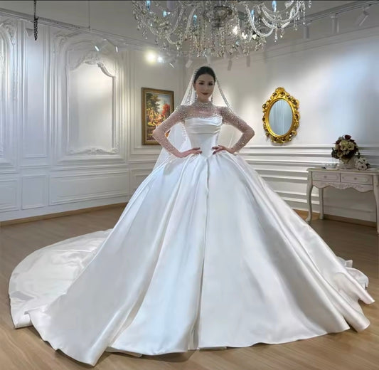 Modern And Modest Mikado Satin Strapless Beaded Neckline A-Line Gown With Long Sleeve Beaded Jacket.