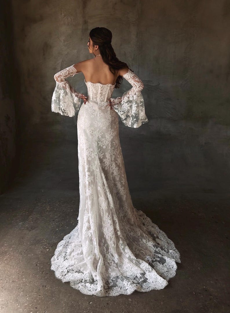 Breathtaking Scattered Floral Lace Corset Inspired Boho Themed Trumpet Bridal Gown With Matching Detached Flare Sleeves