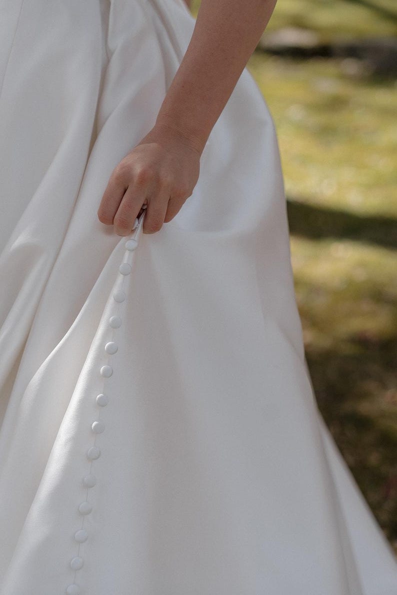 Pleated Off The Shoulder Plunging Sweetheart Floral Appliqué Minimalist A-Line Bridal Gown