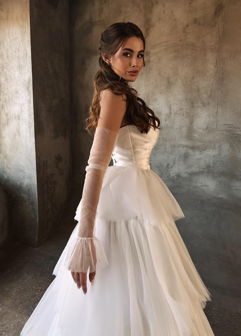 Sweet & Strapless V-Neck Criss Cross Pleated Bodice And Layered Gown With Front Split And Detached Sheer Sleeves