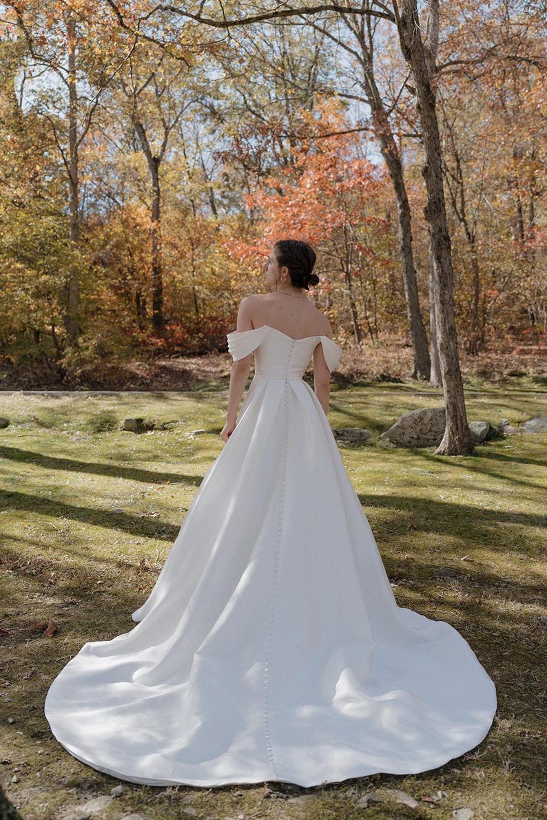 Pleated Off The Shoulder Plunging Sweetheart Floral Appliqué Minimalist A-Line Bridal Gown