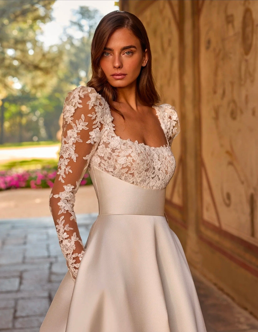 Classically Romantic Long Sleeve Lace Square Neckline With Mikado Waistline And Skirt And Lace Trimmed Train Detail A-Line Gown