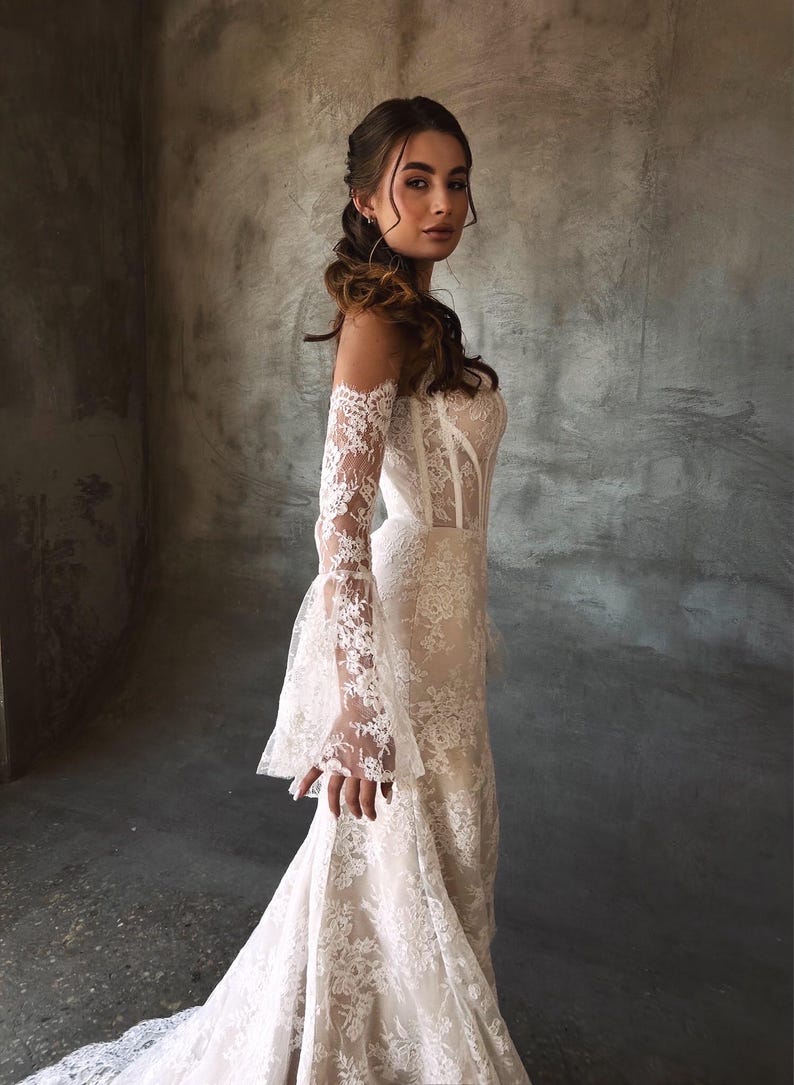 Breathtaking Scattered Floral Lace Corset Inspired Boho Themed Trumpet Bridal Gown With Matching Detached Flare Sleeves