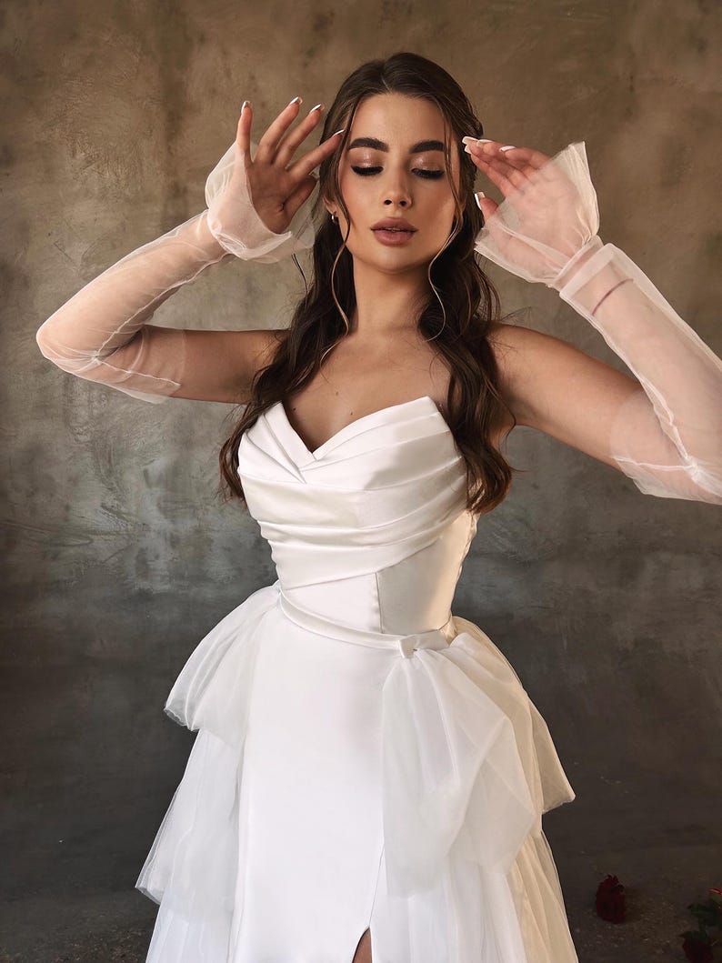 Sweet & Strapless V-Neck Criss Cross Pleated Bodice And Layered Gown With Front Split And Detached Sheer Sleeves