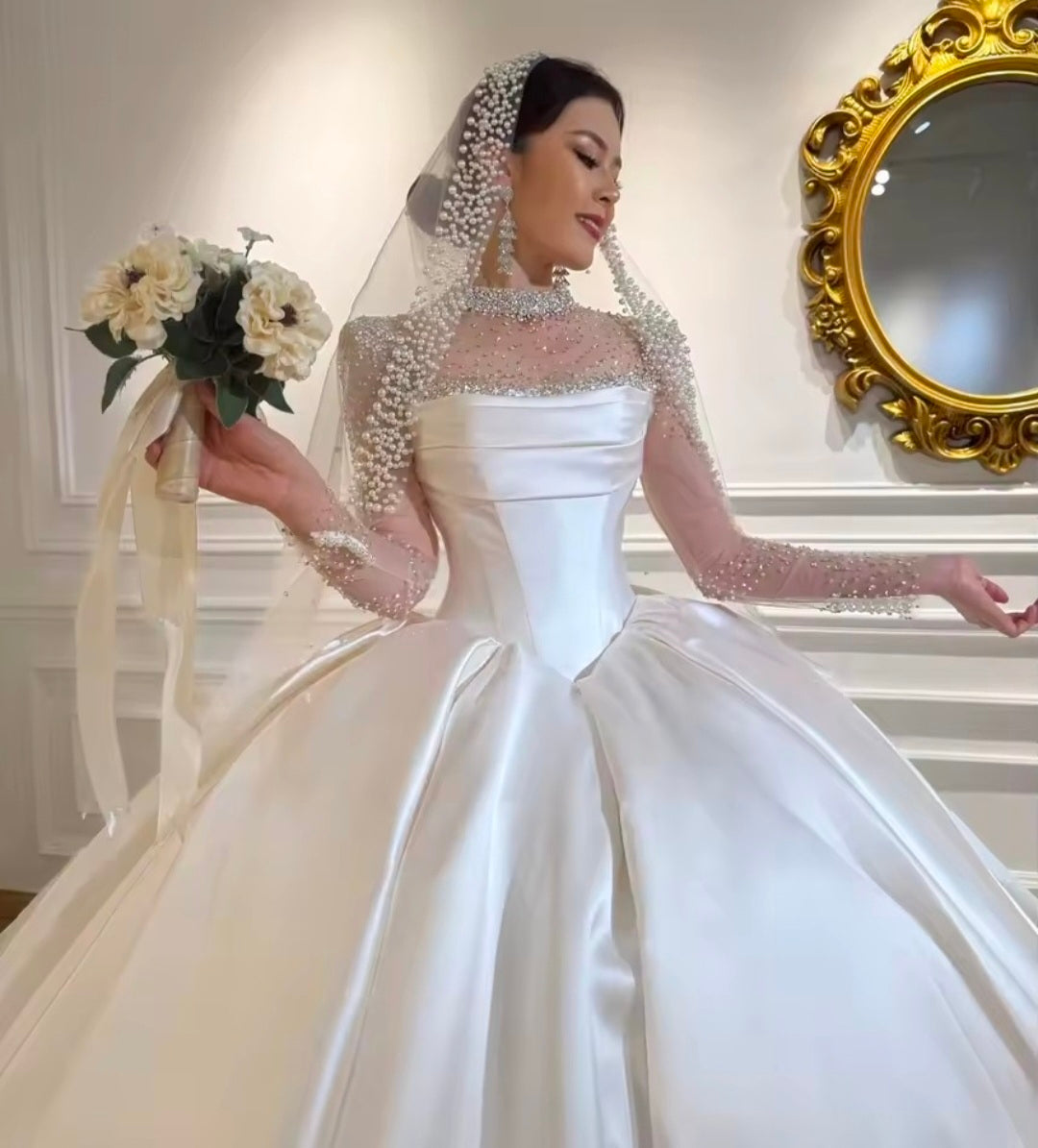 Modern And Modest Mikado Satin Strapless Beaded Neckline A-Line Gown With Long Sleeve Beaded Jacket.